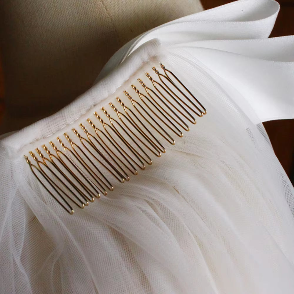 Elegant Two-Layer Elbow Bridal Veil in White Tulle with Satin Bow - Simple Cut Edge.